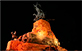 Imagen nocturna de la parte superior del monumento Cerro de la gloria de Mendoza